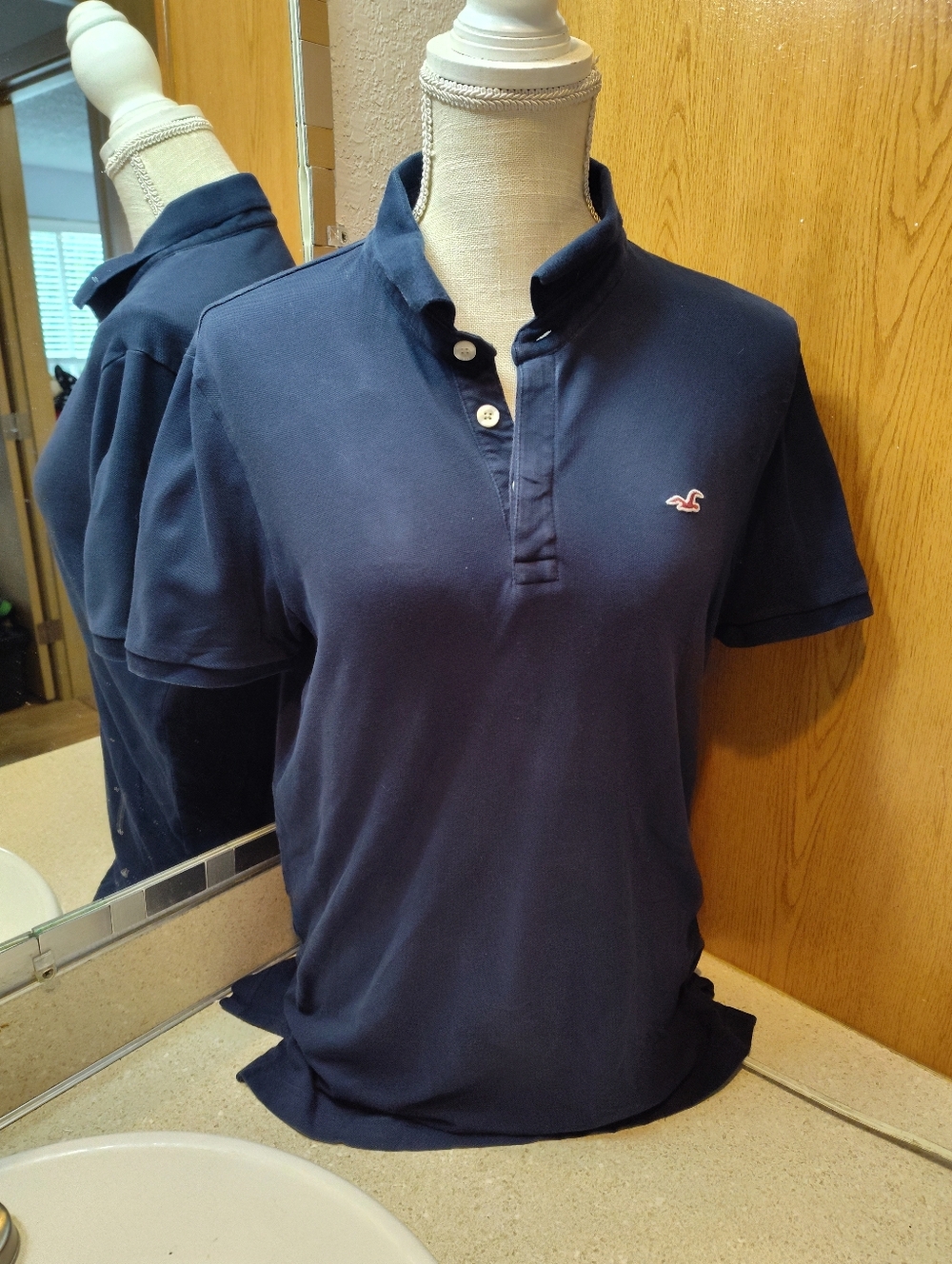 Hollister Men’s Navy Polo with Pink Logo
